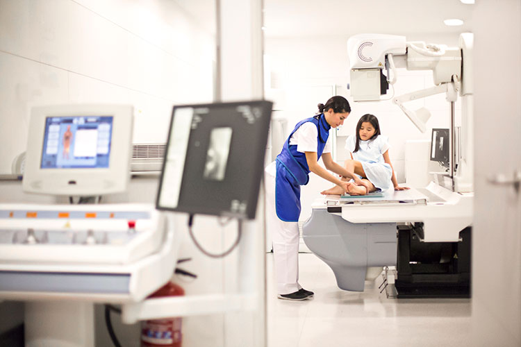 Child being examined by healthcare worker