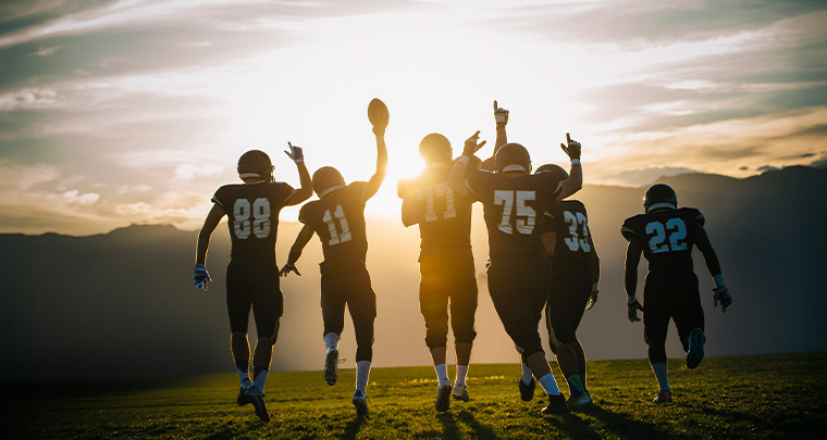 A group of football players running