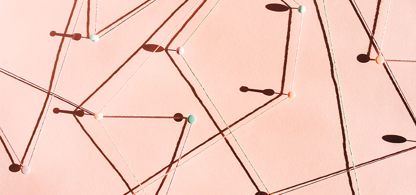 Push pins connected by a string