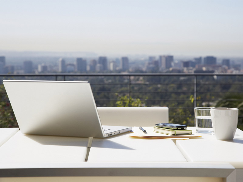 Laptop on outdoor deck