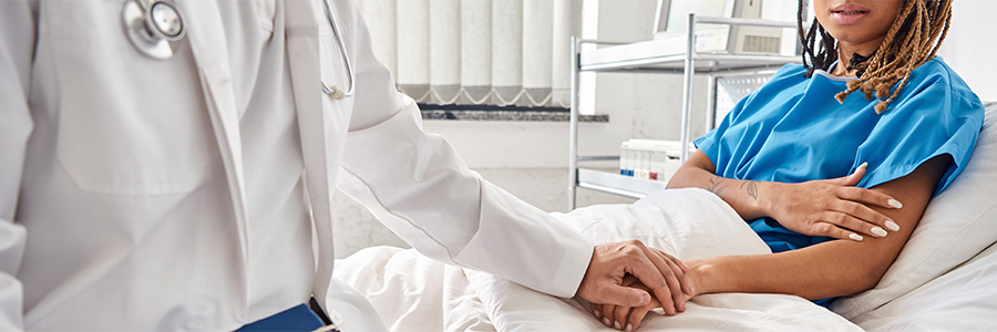 Woman in hospital bed