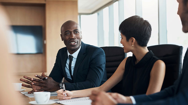 Business meeting in a modern conference room.