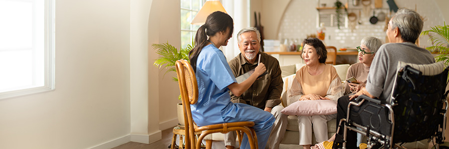 Group of elderly talking with a nurse