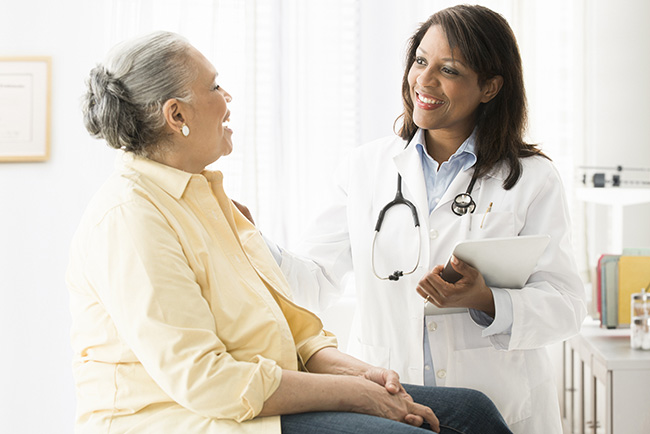 Woman speaking to a doctor