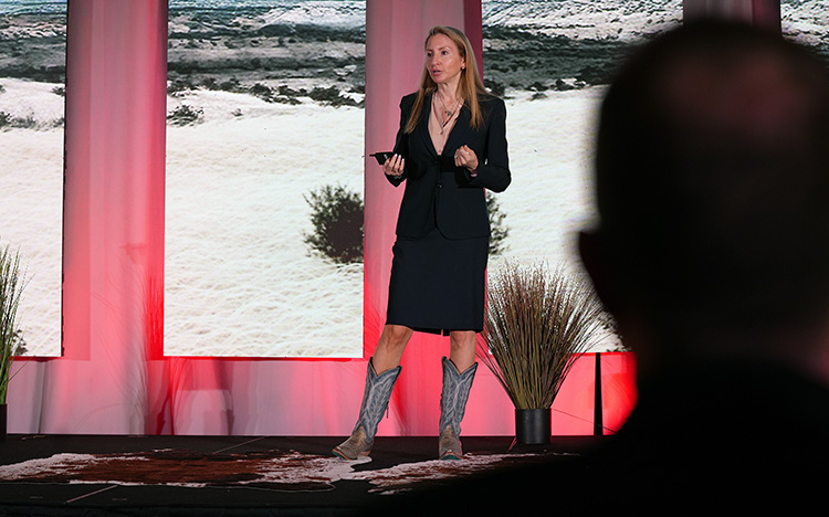 Shoshana Krilow gives a speech on stage