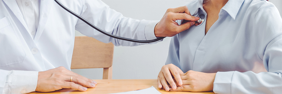 Doctor using a stethoscope 